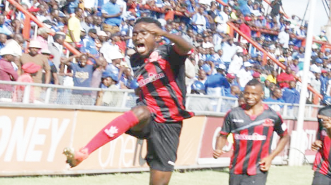 Clive Augusto celebrates a goal against Dynamos at Barbourfields