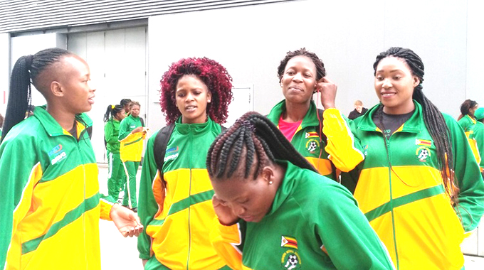 YOU’LL NEVER WALK ALONE . . . Members of the Zimbabwe senior netball team (from left) Melina Banda, Mercy Mukwadi, Stembile Chitiva, Tafadzwa Mawango and Beauty Sithole (in front) share a lighter moment as they leave the training facility at the M&S Bank Arena in Liverpool, England, yesterday ahead of the 2019 Vitality Netball World Cup which gets underway on Friday. — (Picture by Ellina Mhlanga)