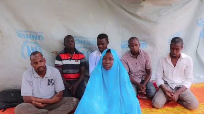 The video shows an aid worker, who gives her name as Grace, asking for help from the international community