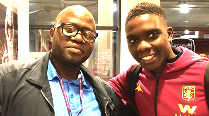 ZIMBABWEAN AFFAIR . . . Aston Villa midfielder Marvelous Nakamba (left) poses for a photograph with fellow Zimbabwean, Stanley Kwenda, a journalist and producer of the BBC “Where Are They Now’’ series, at the Emirates in London on Sunday night