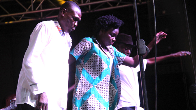 Picky Kasamba (left) and Selmor Mtukudzi on stage at Tuku Memorial concert