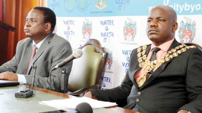 Bulawayo Mayor Solomon Mguni (right) and Town Clerk Mr Christopher Dube give an update on the water situation in the city during a Press conference at the council chambers yesterday