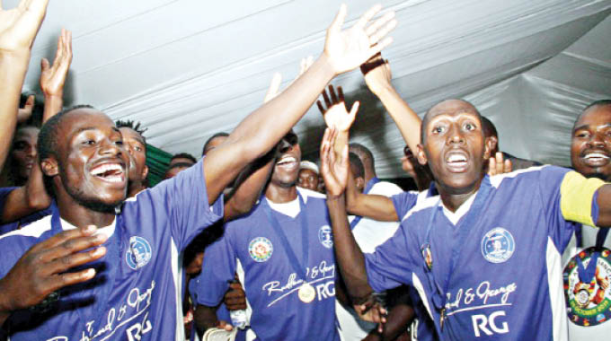 Dynamos stand-in captain Godfrey Mukandi (right) leads his team in celebration after they beat Highlanders in the Anti-Sanctions Cup game at the National Sports Stadium in Harare yesterday. – Picture by Kudakwashe Hunda