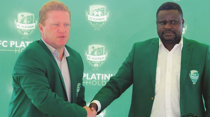 PURE PLATINUM POWER . . . FC Platinum chairman Evans Mtombeni (right) welcomes new coach Hendrik Pieter de Jongh to the club at the unveiling ceremony held at Mandava yesterday.