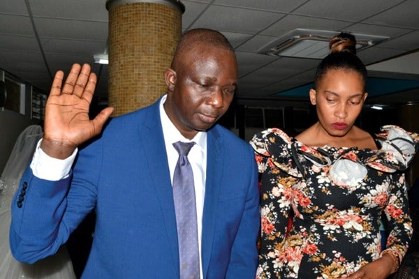 Bev and her husband Chambuka Mupudzi exchanging wedding vows at the Harare Magistrates Court (Picture by NewsDay)