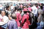 Schools charging in forex face de-registration . . . Tuition fee hikes banned Pupils from various boarding schools wait for transport back to school at the Large City Hall car park in this file photo