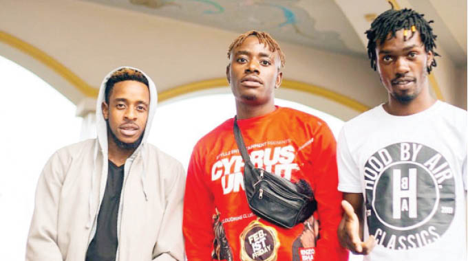 Mr Styllz flanked by artistes Trevor Dongo (left) and Enzo Ishal (right)