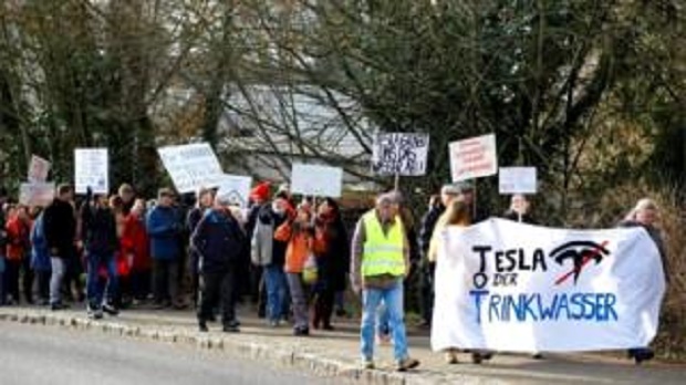 Demonstrators take part in an anti-Tesla protest in Germany