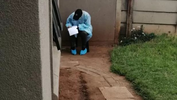 An Ipid investigator at the scene of the crime where a man was shot and killed when tavern patrons and the community attacked the police who were trying to enforce lockdown regulations in Vosloorus.