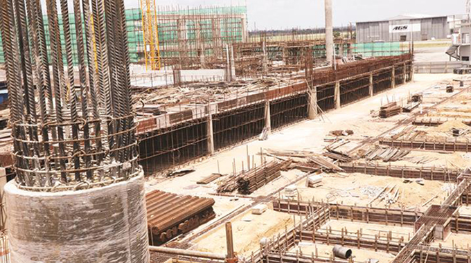 Expansion work underway at Robert Gabriel Mugabe International Airport in Harare. The US$153 million project is scheduled to be completed at the end of 2021. The works entail expanding the international terminal building, aprons and the installation of four new air bridges and a VVIP pavilion. The project includes the upgrading of the ground lighting system and communication systems.— Picture: Memory Mangombe