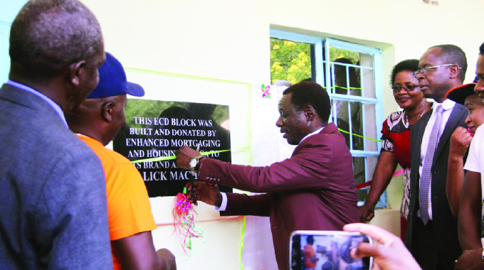 Sungura maestro Alick Macheso unveiling an ECD block at his former school Enterprise Primary in Shamva. pictures by Nyasha Chawatama