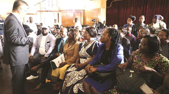 Chinese Deputy Ambassador to Zimbabwe Zhao Baogang addresses parents of students studying in China on the coronavirus situation at Prince Edward School in Harare. — Picture: Memory Mangombe