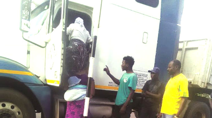 A truck driver breaches transport and lockdown regulations by ferrying passengers at Mbudzi Roundabout along Harare-Masvingo Road