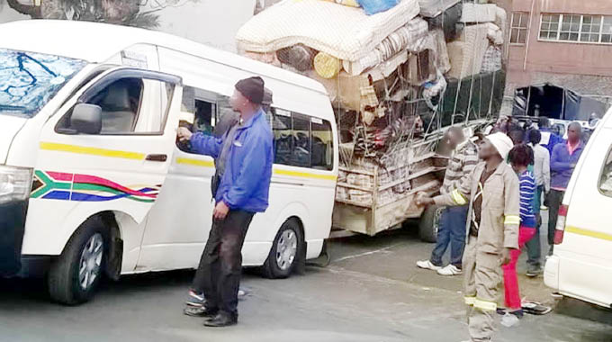 Umalayitsha delivering luggage