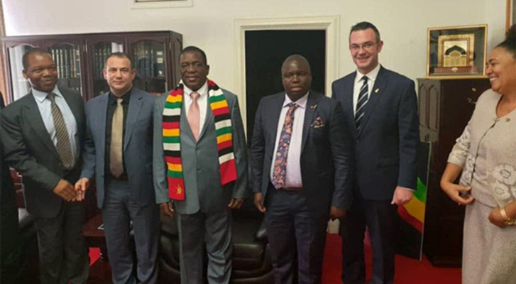 President Emmerson Mnangagwa seen here with crook Delish Nguwaya