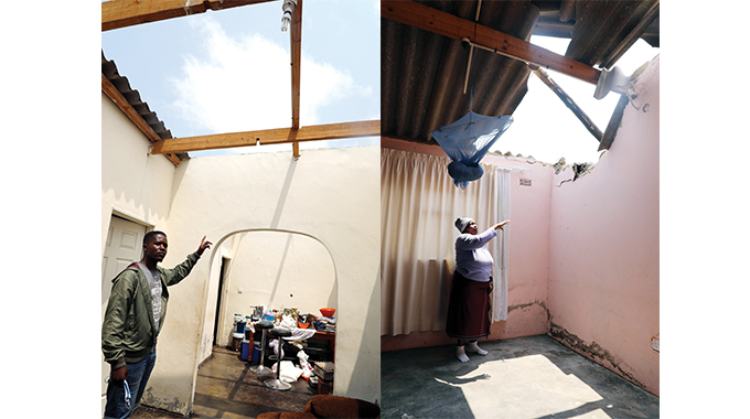 Cowdray Park residents assess the damage to their homes in the aftermath of a violent thunderstorm and strong winds that hit the suburb on Tuesday night