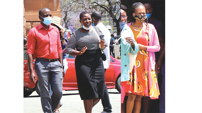 Precious Sibanda-Makowe with her husband and Pretty Moyo (right) at court