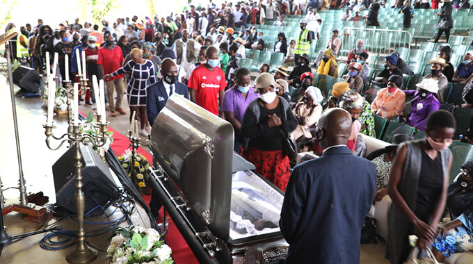 Mourners pay their last respects to Cal Vin at Bulawayo Amphitheatre yesterday