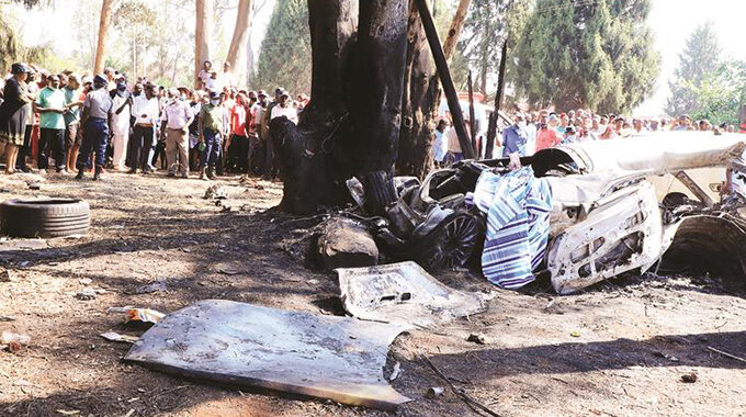 The wreckage of the Rolls Royce in which Genius “Ginimbi” Kadungure and his three friends were killed following a head-on collision with a Honda Fit in the Philadelphia area, along Borrowdale Road in Harare yesterday. — Picture: Tawanda Mudimu