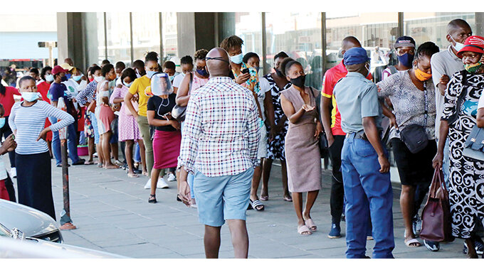 The Black Friday shopping craze hit Bulawayo yesterday as people jostled to buy goods at discounted prices in clothing, furniture and hardware shops. — Pictures by Nkosizile Ndlovu
