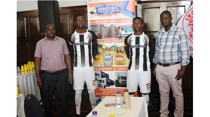 Bosso players, Nqobizitha Masuku (second from right) & Mbongeni Ndlovu pose in new kit (pictures by Washington Sibanda)