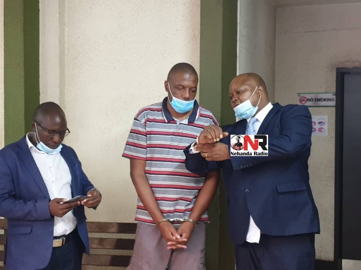 Hopewell Chin'ono seen here with lawyer Job Sikhala arrives at the Harare Magistrates' Court in November 2020