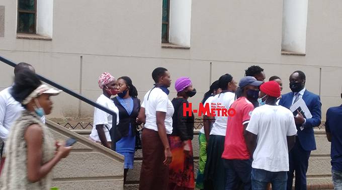 Mourners outside Doves funeral parlour on Wednesday