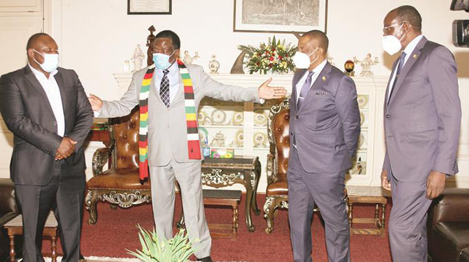 President Emmerson Mnangagwa introduces former MDC-T legislator for Masvingo Central Tongai Matutu (left) to Vice Presidents Constantino Chiwenga and Kembo Mohadi (right) at State House. — Picture Innocent Makawa