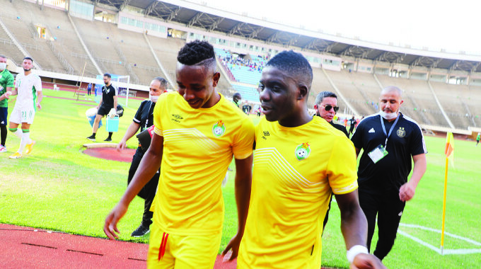 A HUMBLE PRINCE . . . Zimbabwe international midfielder, Marvelous Nakamba, congratulates his Warriors teammate, Prince Dube, for scoring the goal which helped the senior national team snatch a point against Algeria at the National Sports Stadium on Monday