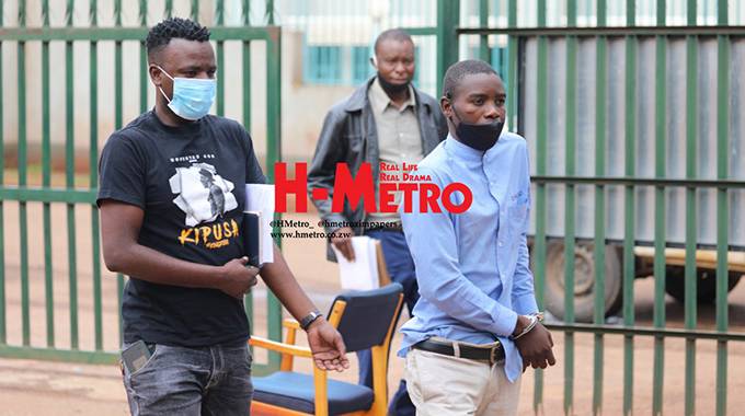 Morris Maphosa Chuake (handcuffed)