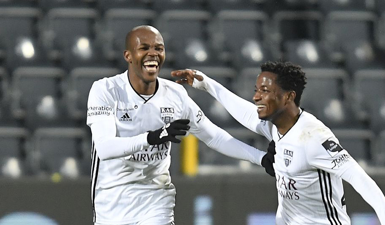 SHORTLIVED JOY . . . Zimbabwe international football striker Knowledge Musona (left) celebrates with his teammate after scoring one of his two goals for his Belgian side KAS Eupen against Zulte Waregem before they went on to lose 2-3 on Tuesday night