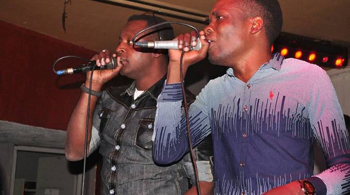 Tryson Chimbetu (right)