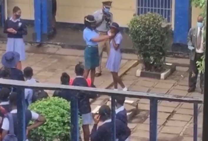 A police officer based at Kwekwe Central Police Station has landed herself in trouble after a video of her allegedly slapping a Kwekwe High School pupil for not wearing a mask, went viral on social media.