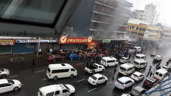 One person has been arrested and police are pursuing a group of other people who went on the rampage in the Durban city on Monday, looting and setting shops alight. Picture: Facebook.