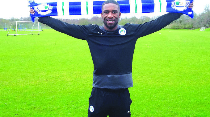 Tendayi Darikwa has signed a fresh two-year contract with Wigan Athletic in the English League One.