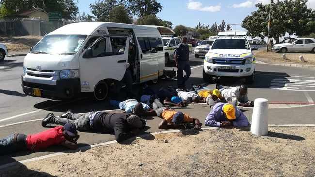 Nine suspects were arrested after two firearms were discovered in a minibus taxi en route to Cape Town. Photo: SAPS