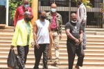 US$2,7m heist suspect killed in shoot-out, three still on the run Police detectives escort the US$2.7million Harare-Chirundu Road robbery suspects into the Harare Magistrates Courts. — Picture: Lee Maidza