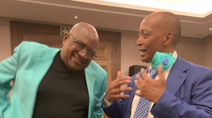 Aspiring CAF president Patrice Motsepe (right) shares a lighter moment with Cosafa president Philip Chiyangwa at a recent Mamelodi Sundowns function in Johannesburg