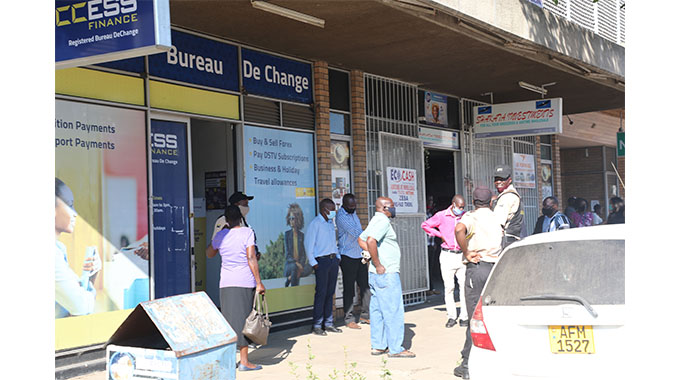 The scene at Access Bereau de Change shortly after the armed robbery