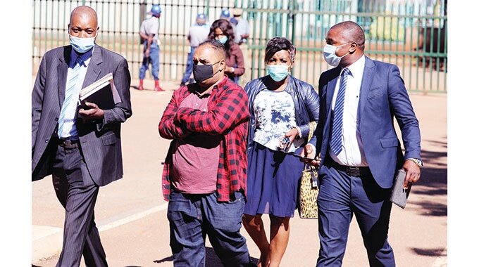 Suspected cocaine dealer Guilherme Sodre Alvenaz da Silveria arrives at the Harare Magistrates Court escorted by police detectives yesterday
