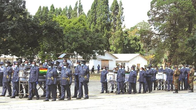 Pallbearers arrive at the funeral parade at Manyame Airbase with the bodies of Airforce of Zimbabwe pilots who died in a helicopter crash in Goromonzi last week. — Picture: Innocent Makawa