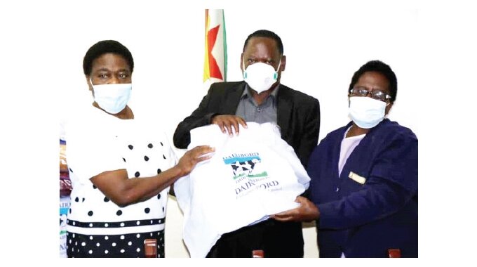 Bulawayo Minister of State for Provincial Affairs and Devolution Honourable Judith Ncube, Mpilo Hospital director of operations Mr Joel Charangwa and senior nursing officer Nokuthula Ncube pose for a photo after a donation of blankets by Dairibord Zimbabwe at the institution’s premises in Bulawayo yesterday