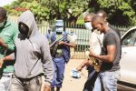 Injured robbers escape after shootout with police in Bulawayo File picture of robbery suspects being taken to court