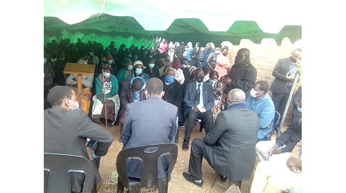 Mourners at Striker's burial