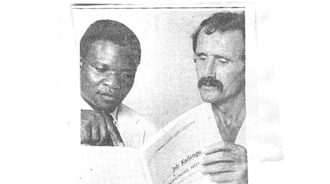 MASTERMINDS. . . The late coaches, Peter Nyama (left) and Mick Poole go through some notes