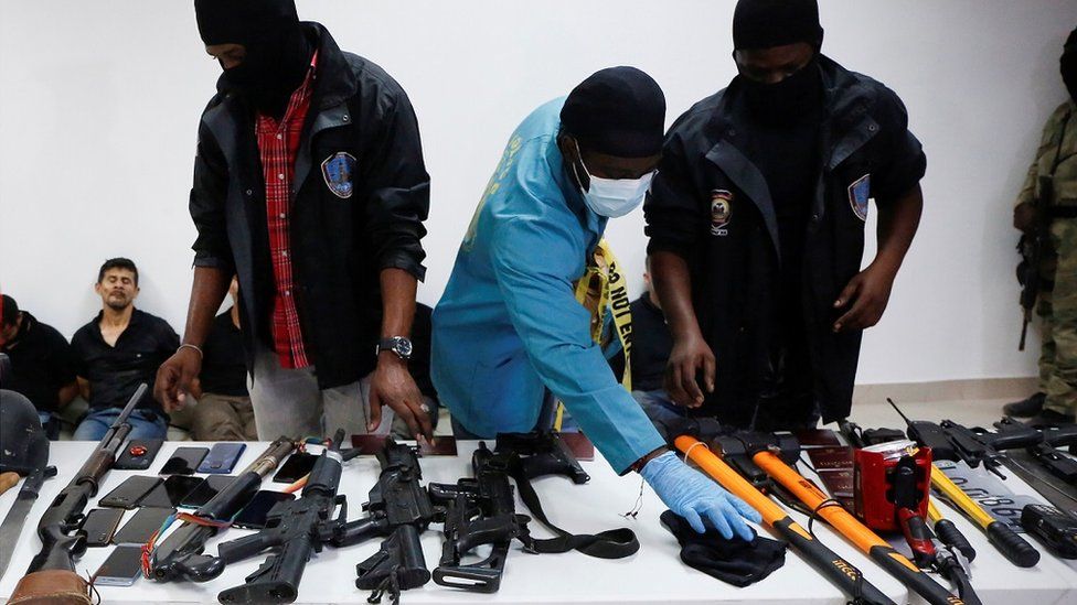 Haiti police presented weapons and some of the detained suspects to the media on Wednesday