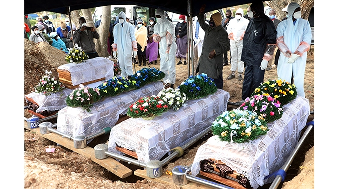 Five Mkandla family members including a child, who died in a horrific car accident in South Africa were laid to rest at West Park cemetery in Bulawayo yesterday