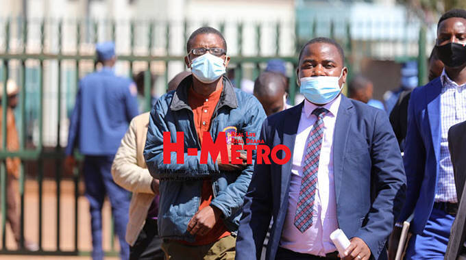 The accused Tinashe Chiraho (left)