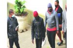Armed robbers appear in court, remanded in custody Two armed robbers Mthokozisi Moyo (second from left) and Makhosi Nkomo being escorted by police details to prison cells at the magistrates’ court housed at Tredgold Building in Bulawayo yesterday