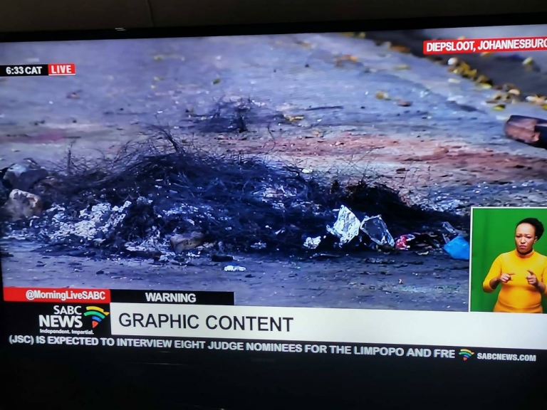 An African, a Zimbabwean, Elvis Nyathi, was BURNT to death by a violent mob in Diepsloot, South Africa.